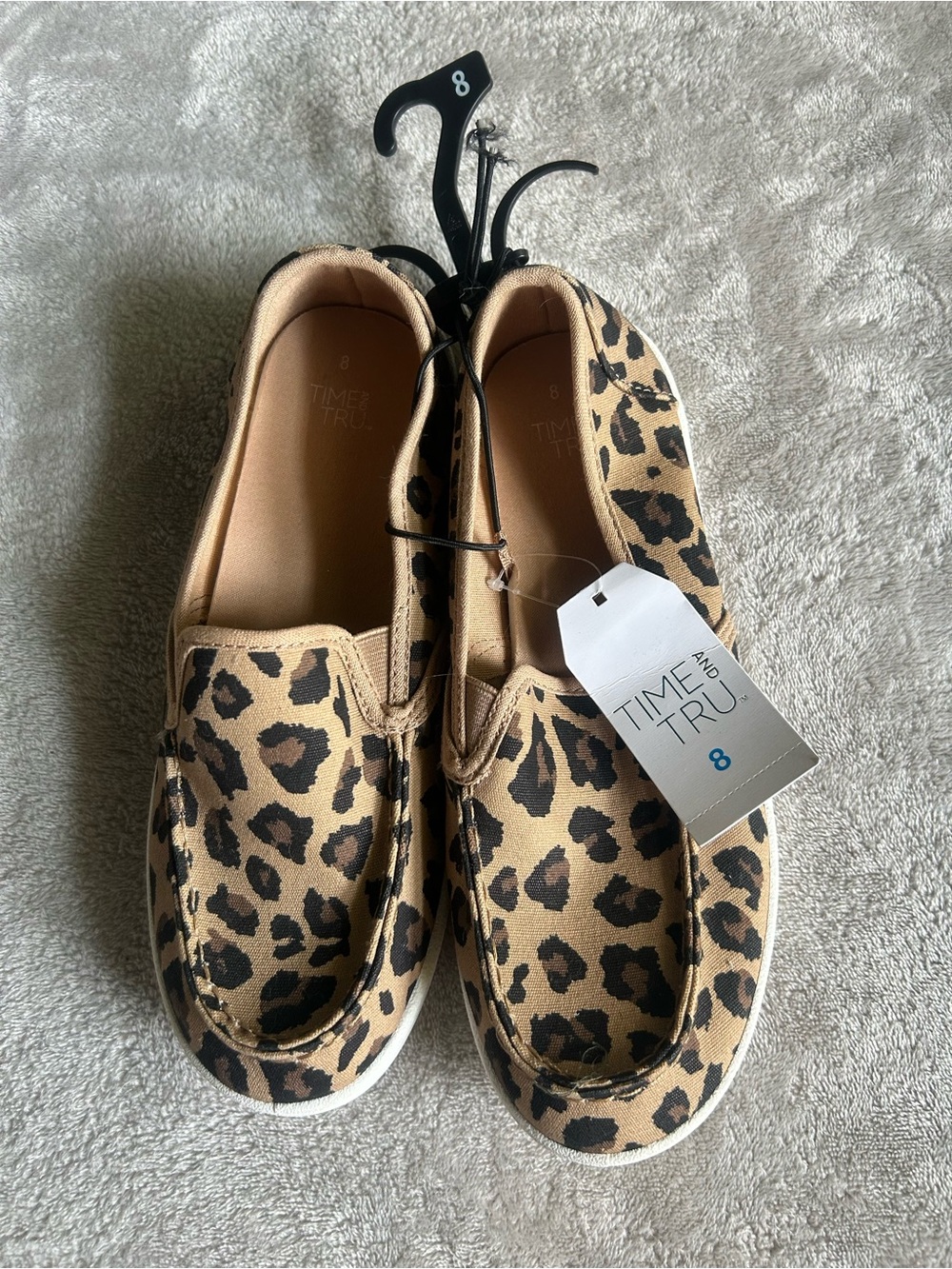 Time and Tru women’s Leopard Slip-On Sneakers in Tan and Black